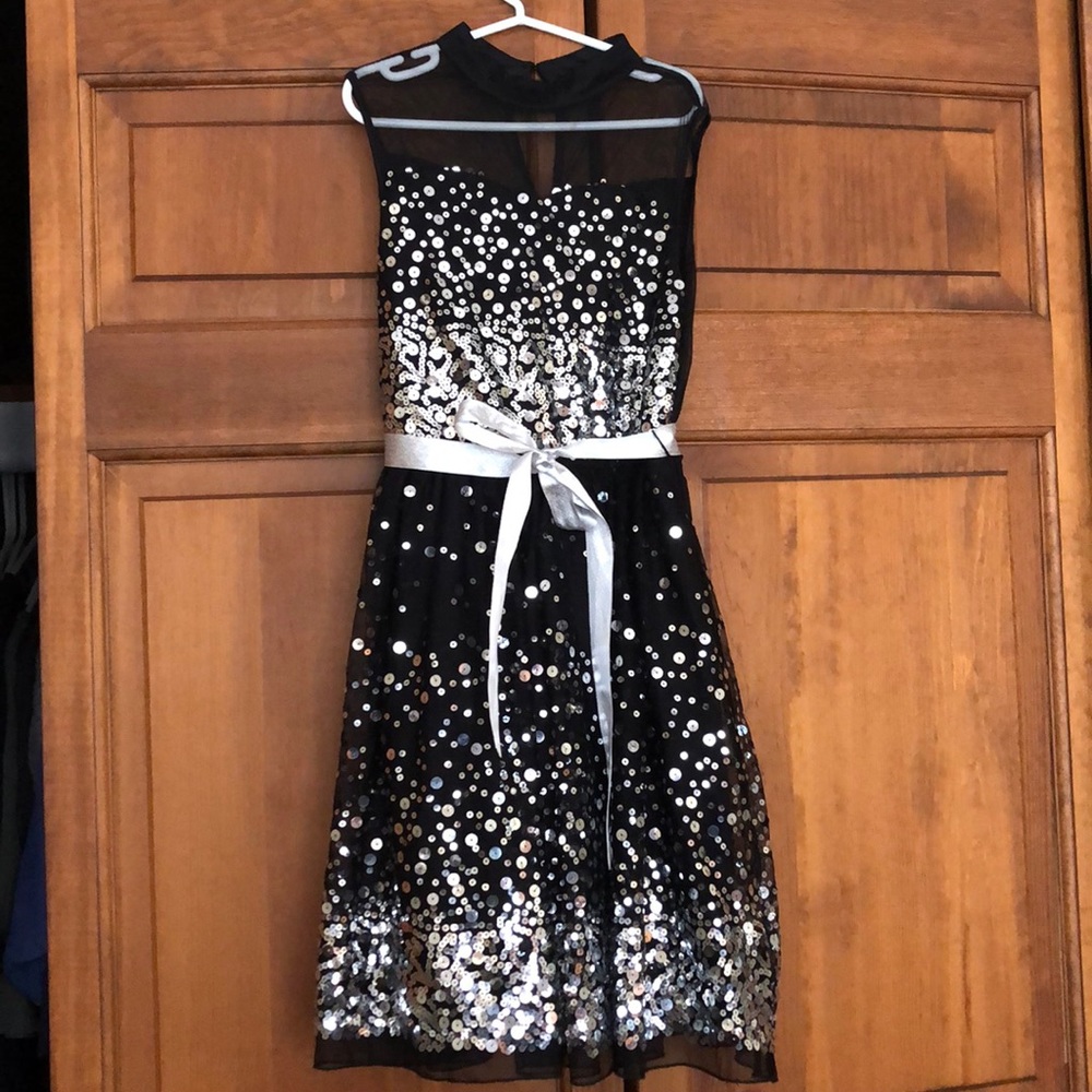 Girls size 8 black dress with silver sequins